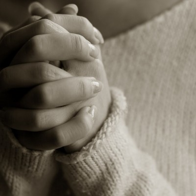 Praying woman hands